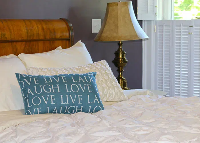 Corner Room Bed and Love Live Laugh Pillow